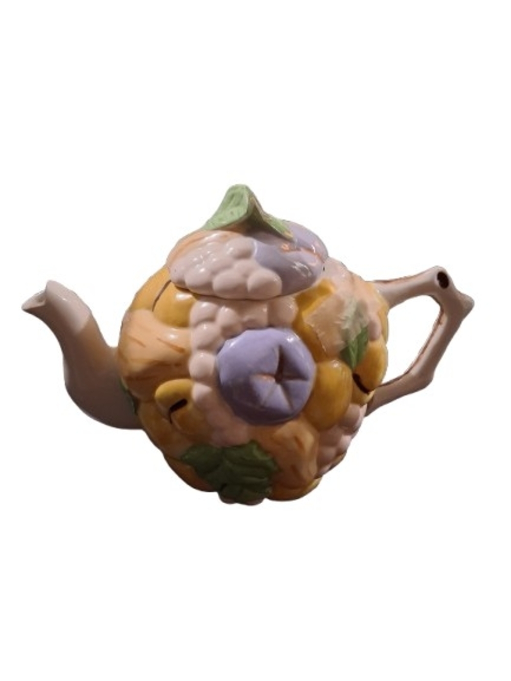 fruit-themed ceramic teapot is most likely a vintage "Tutti Frutti" piece, typic